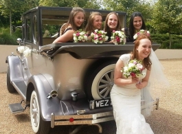 Vintage silver wedding car in Chichester